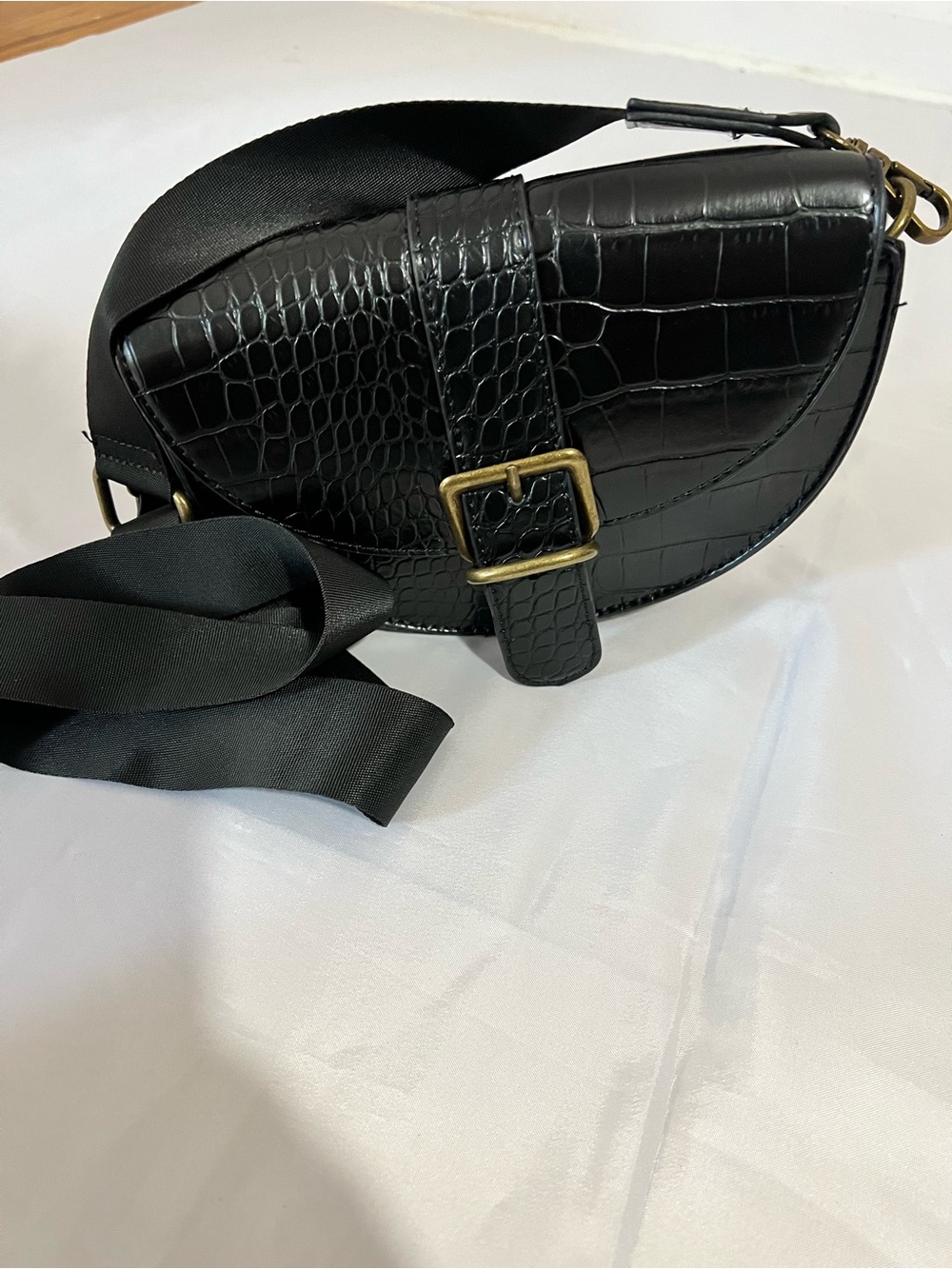 Black Croc-Embossed Crossbody Saddle Bag with Buckle Detail